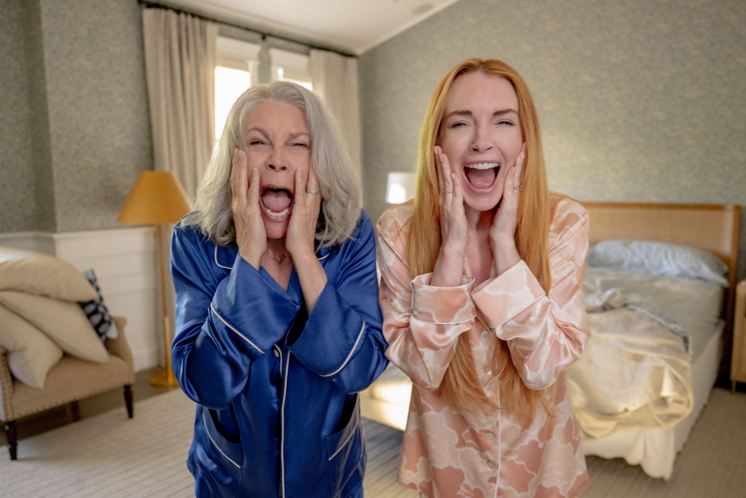 Image may contain Jamie Lee Curtis Lindsay Lohan Head Person Face Adult Happy Laughing Accessories and Jewelry