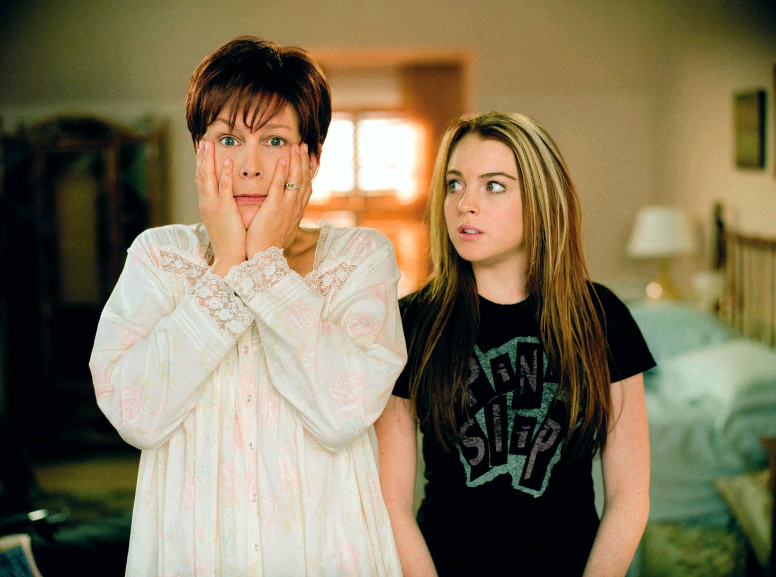 Image may contain Jamie Lee Curtis Lindsay Lohan Face Head Person Photography Portrait Clothing TShirt