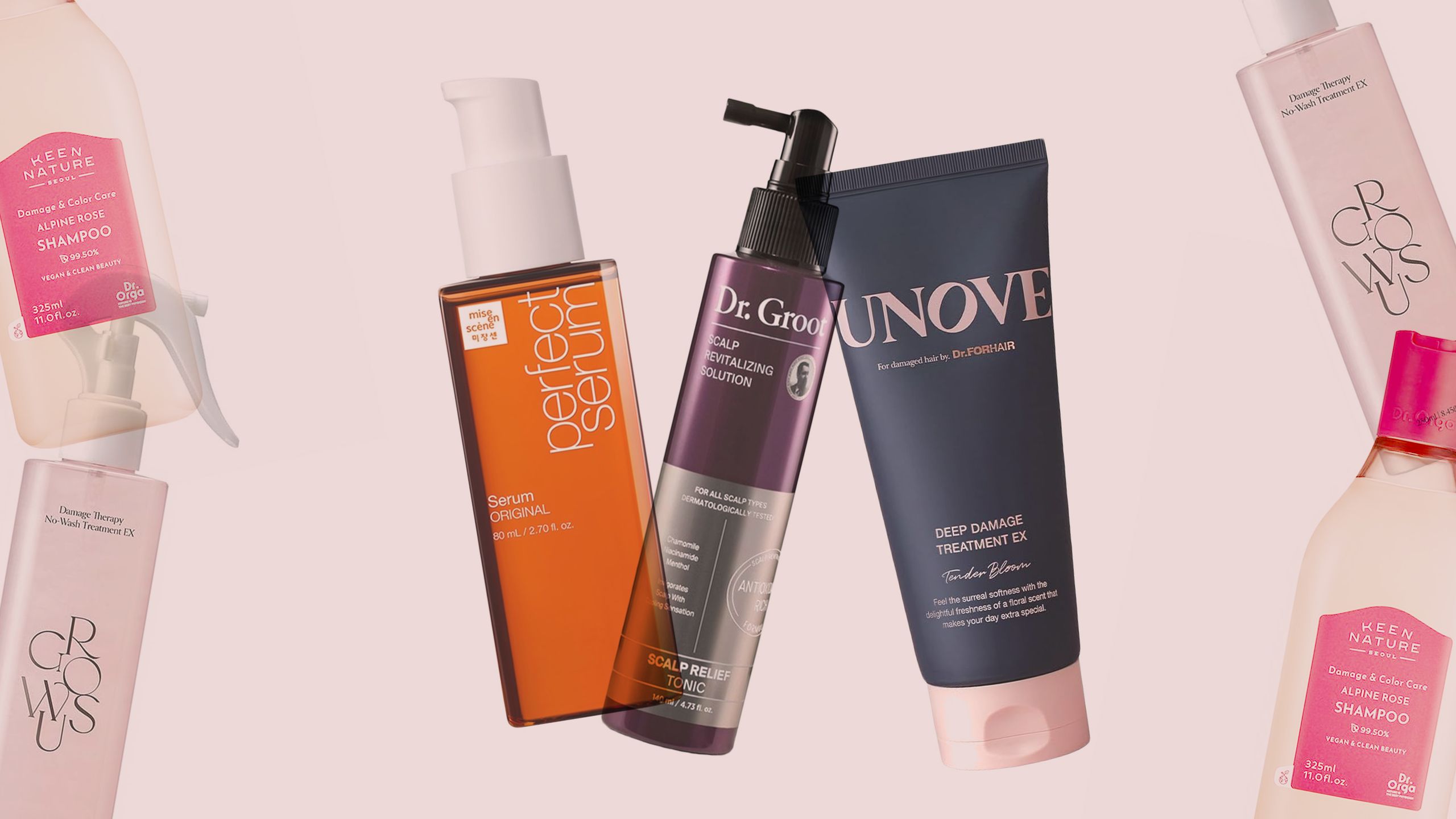Cosmetic items overlapping on a light pink background. Center clear bottle with orange liquid and white pump top narrow...