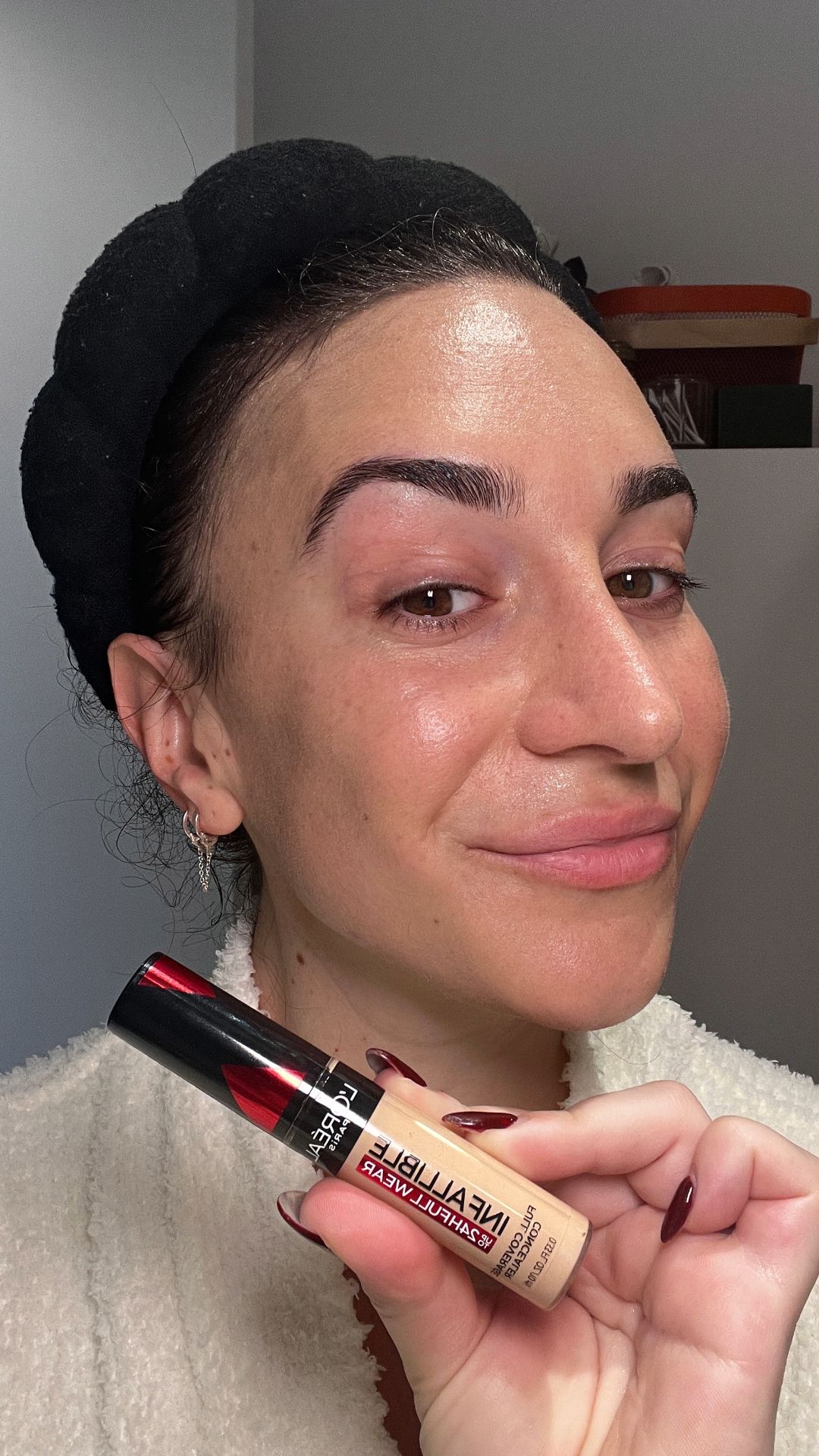 Allure commerce writer Lily Wohlner before applying the LOreal Paris Infallible Full Wear Waterproof Concealer