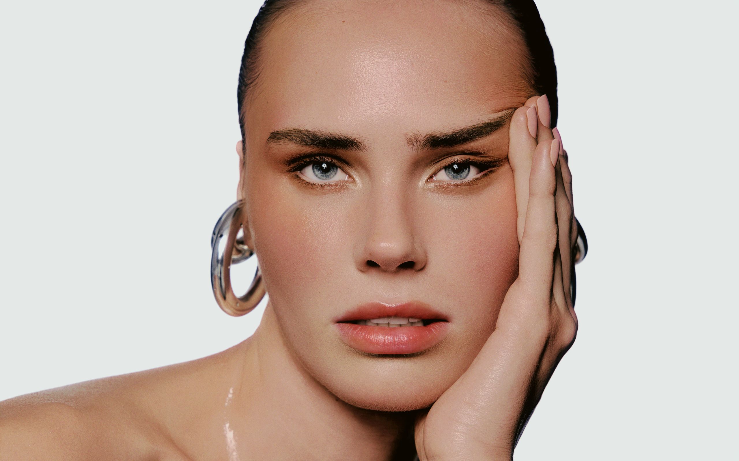 Image may contain Body Part Face Head Neck Person Photography Portrait Adult and Washing