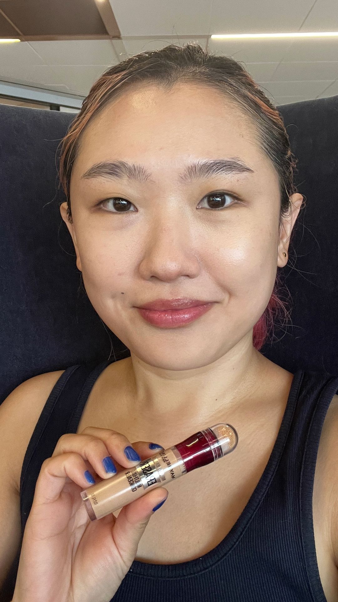 Sarah Han applying the Maybelline Instant Age Rewind MultiUse Concealer