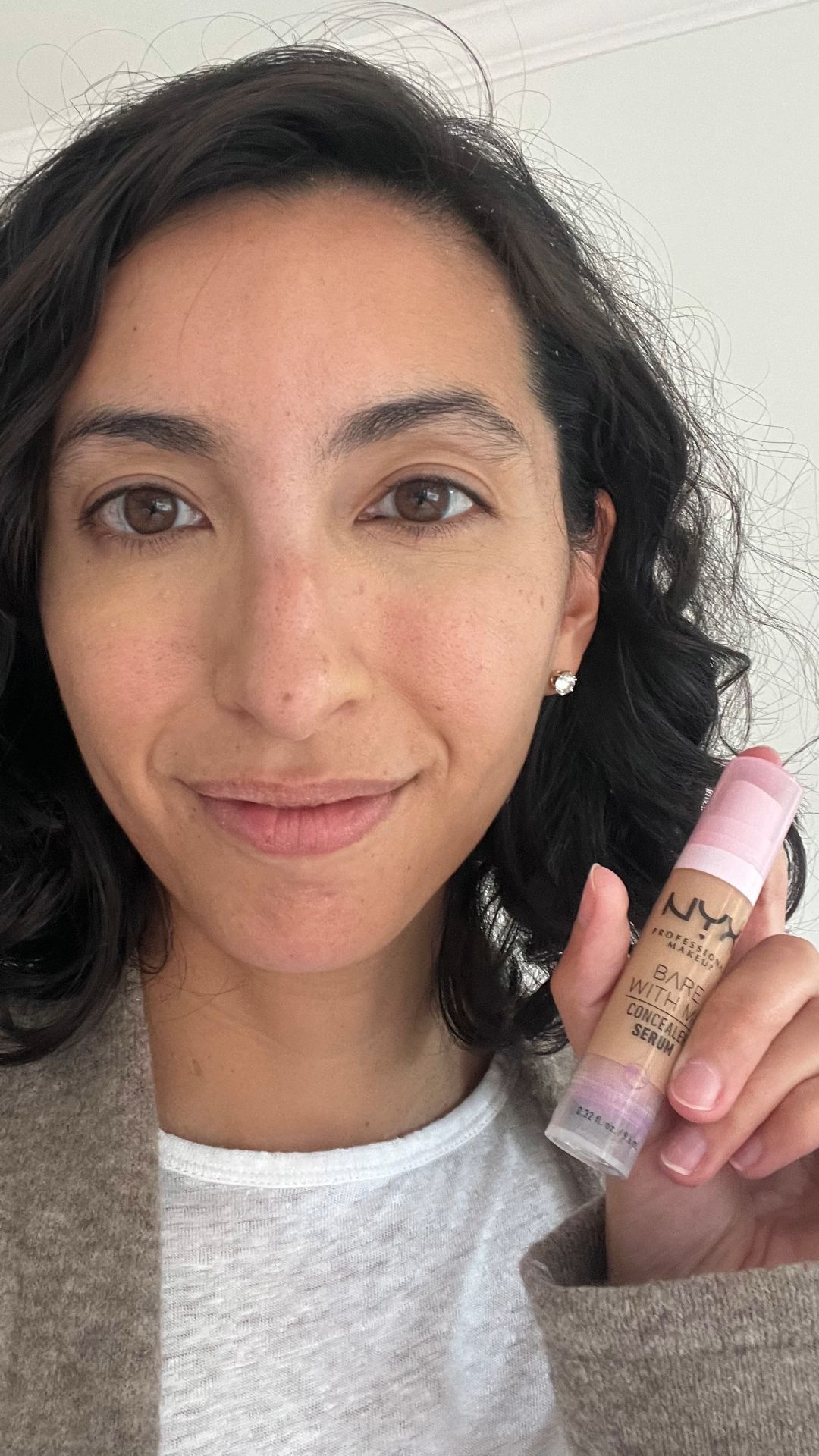 Deanna Pai after applying the NYX Professional Makeup Bare With Me Concealer Serum