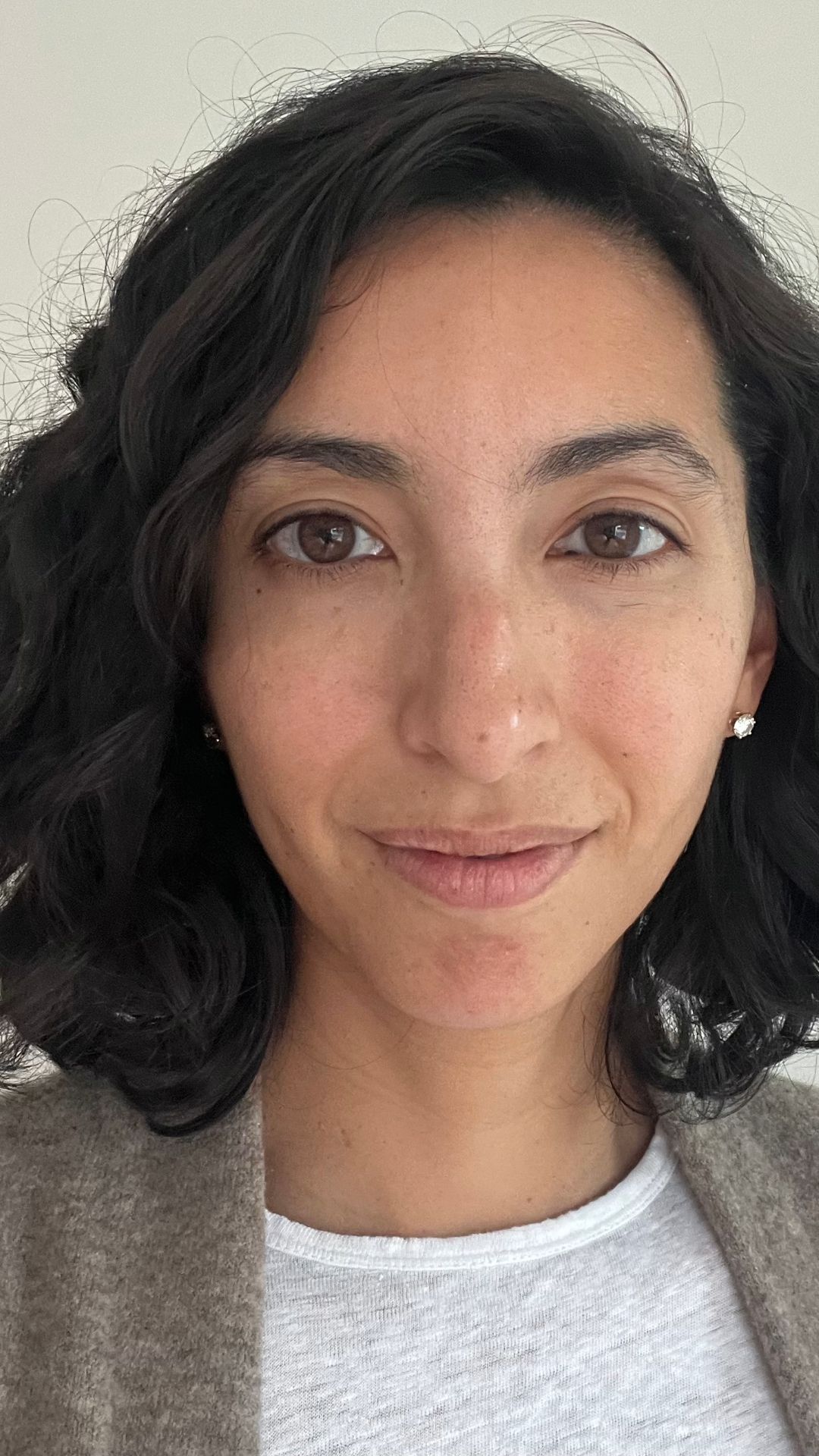 Deanna Pai before applying the NYX Professional Makeup Bare With Me Concealer Serum