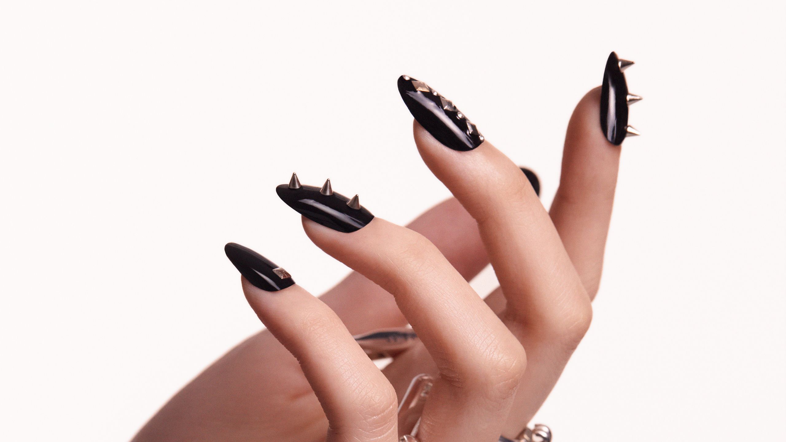 Image may contain Body Part Hand Person Finger Electronics Hardware Nail and Adult