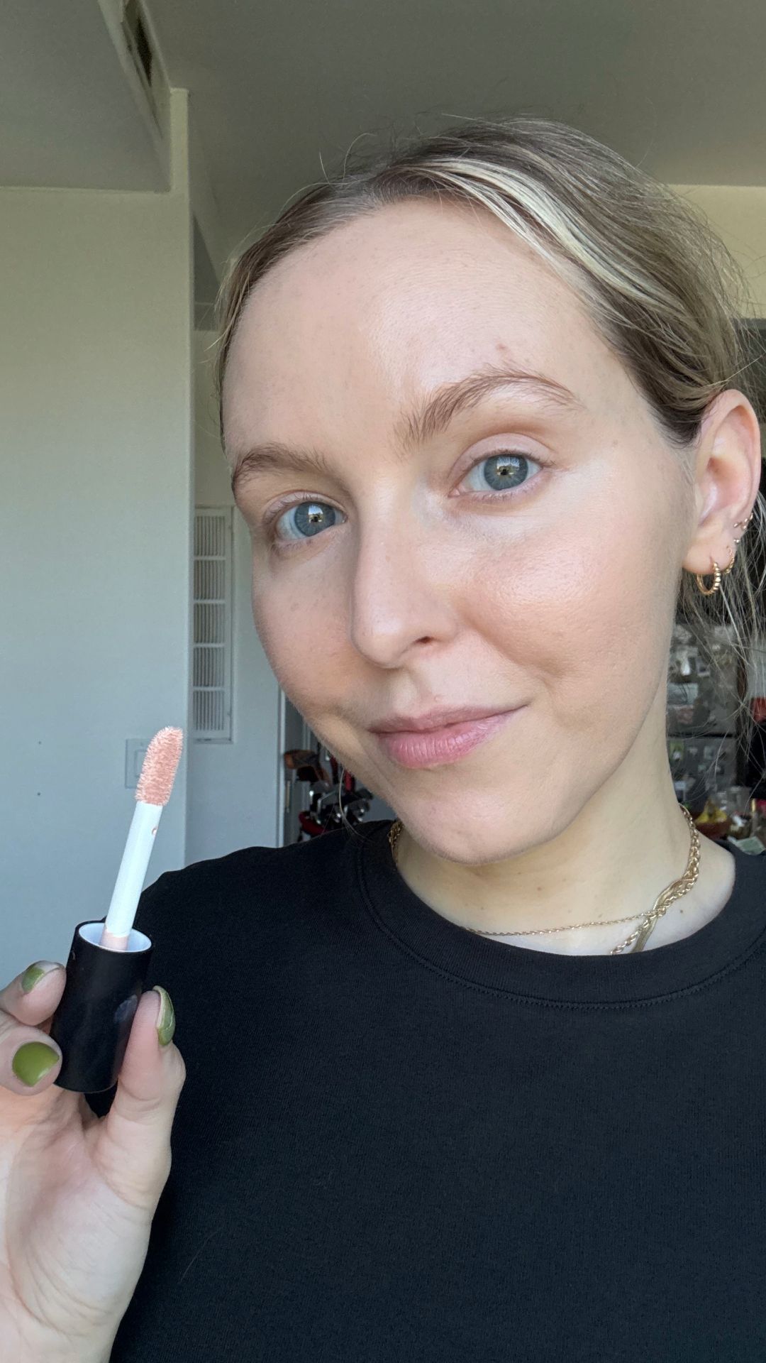 Image may contain Cosmetics Lipstick Head Person Face Brush Device Tool Toothbrush Accessories and Jewelry