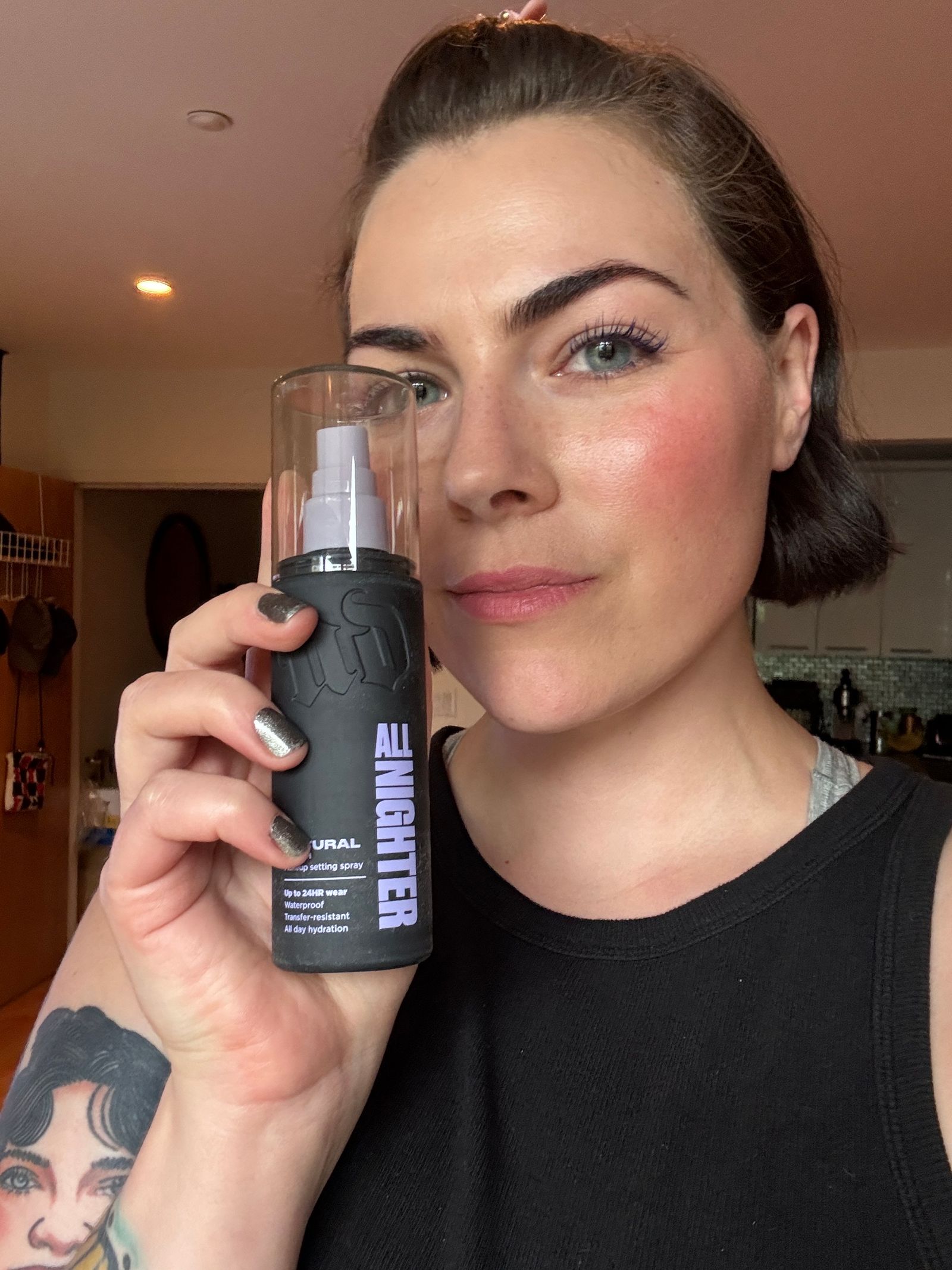woman after wearing urban decay all nighter setting spray reformulation