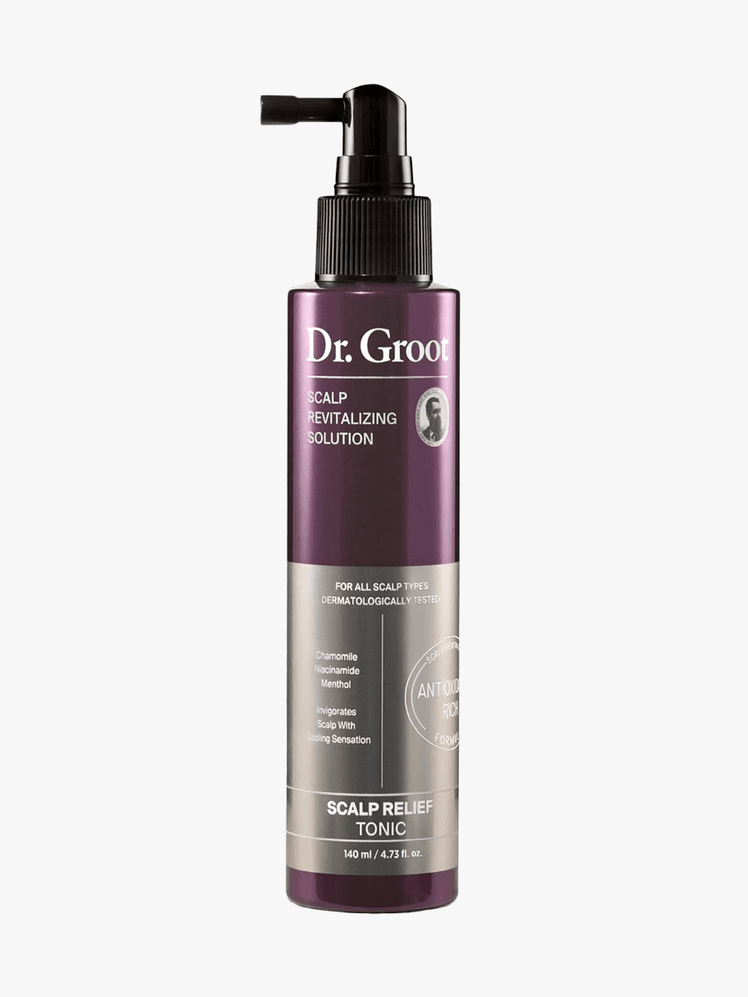 Dr. Groot Scalp Relief Tonic in purple branded bottle component with black cap on a light gray background