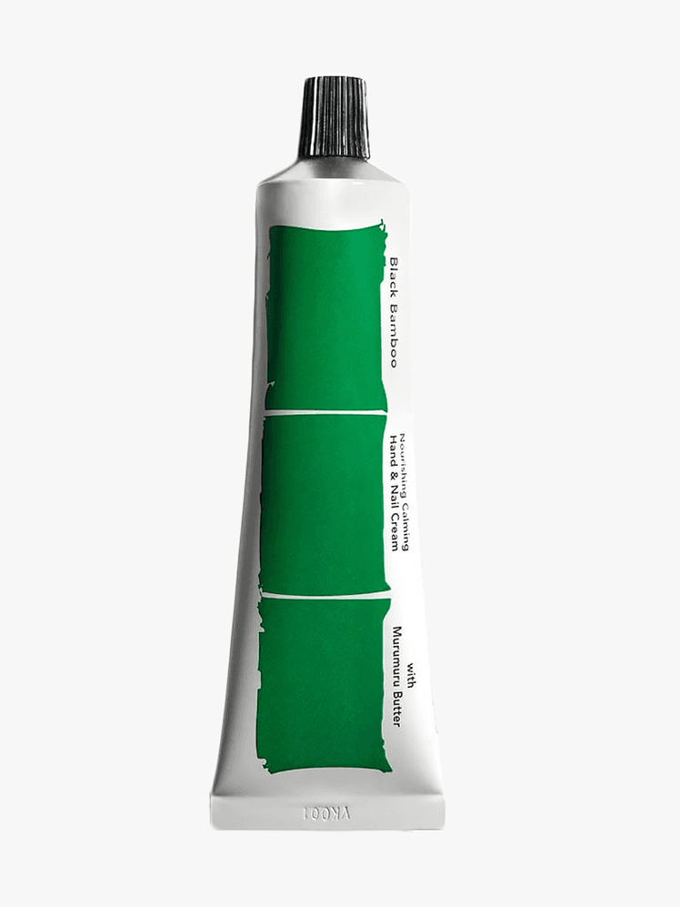 Haruharu Wonder Black Bamboo Nourishing Calming Hand & Nail Cream in branded tube component on a light gray background