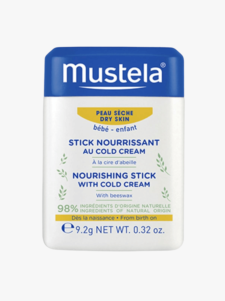Mustela Baby Nourishing Stick on a grey background