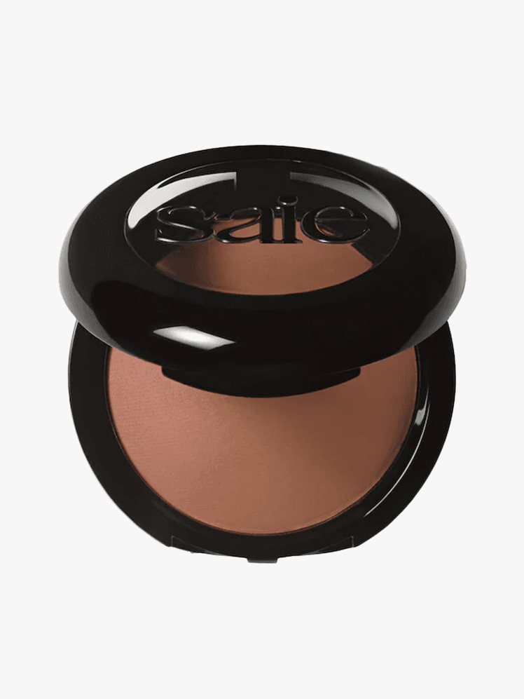 Saie Slip Tint Undetectable Baked Setting Powder in branded component on a light gray background
